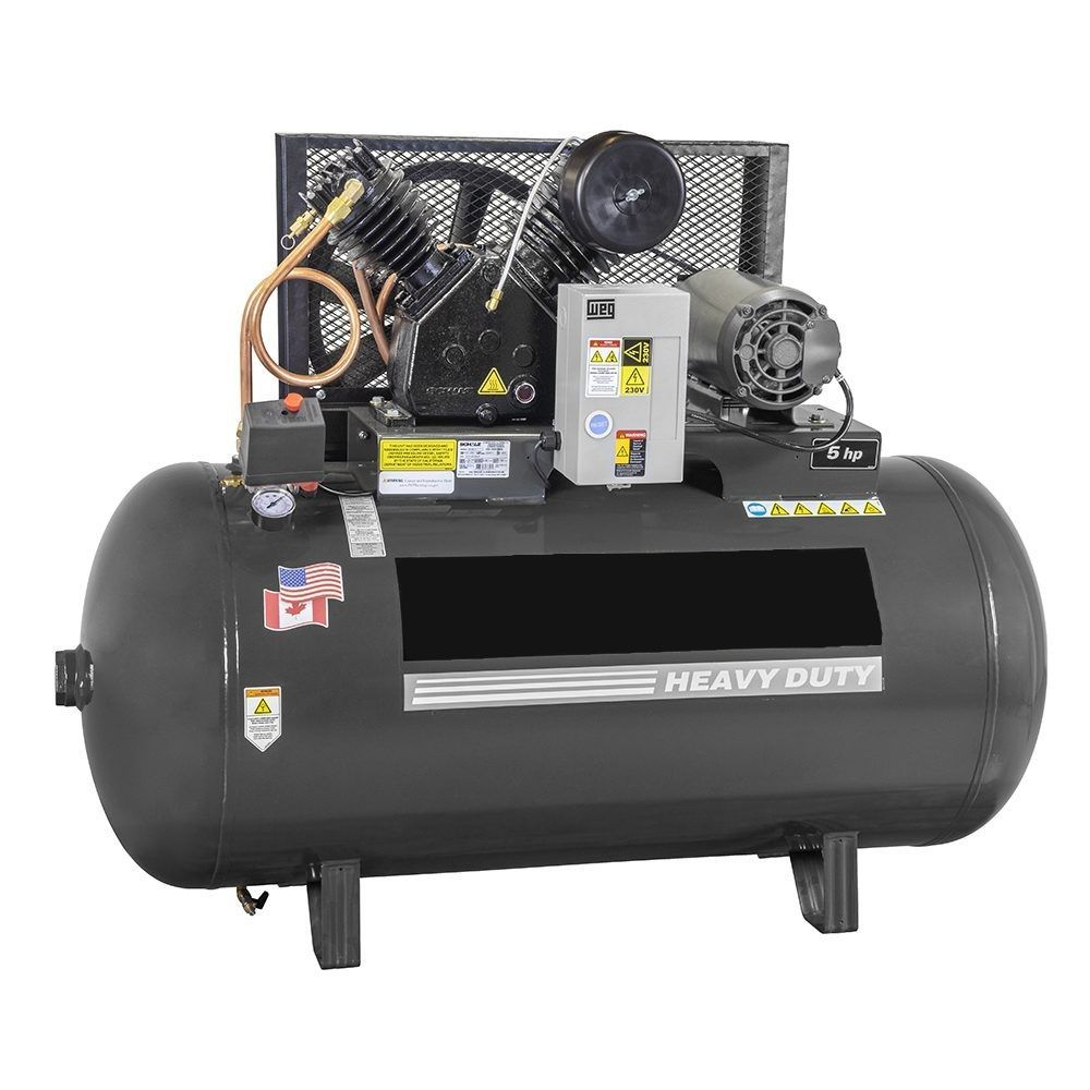 A heavy duty air compressor with a tank and motor.