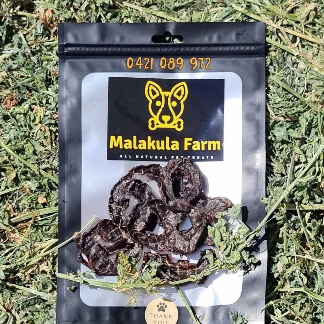 Black pouch with dog treats and