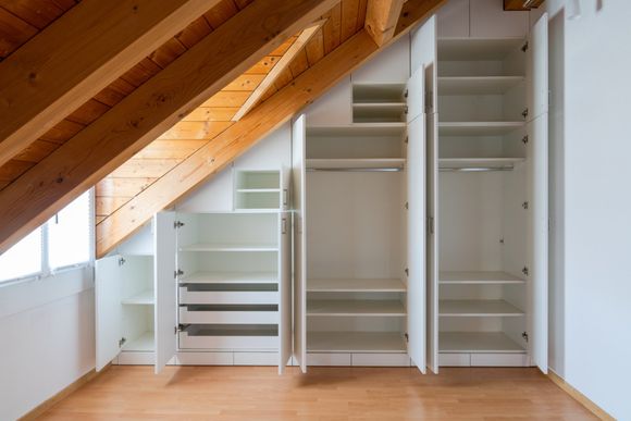 Open Cabinet On Attic — Twin Cities, MN — Top Shelf Painting & Services