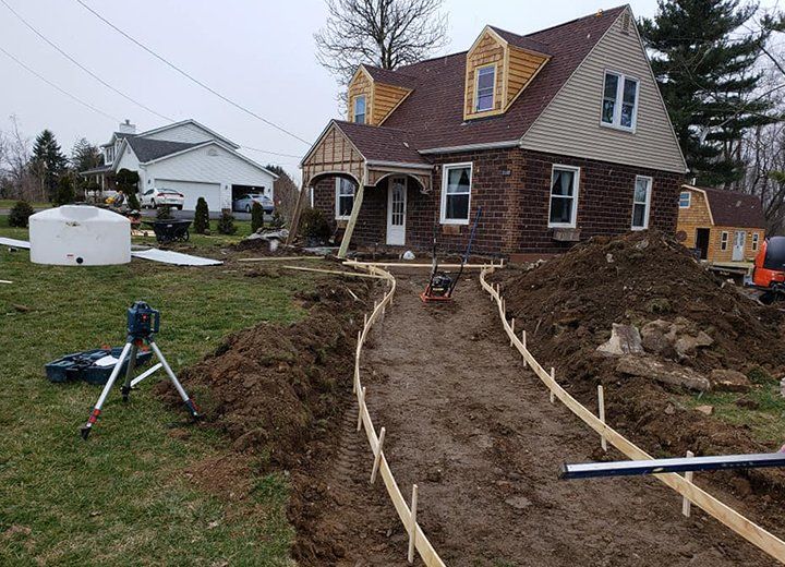 Before Sidewalk Construction — Massillon, OH — Duell Action Builders LLC