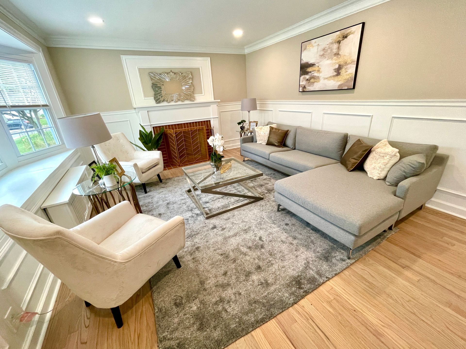 A living room filled with furniture and a fireplace.