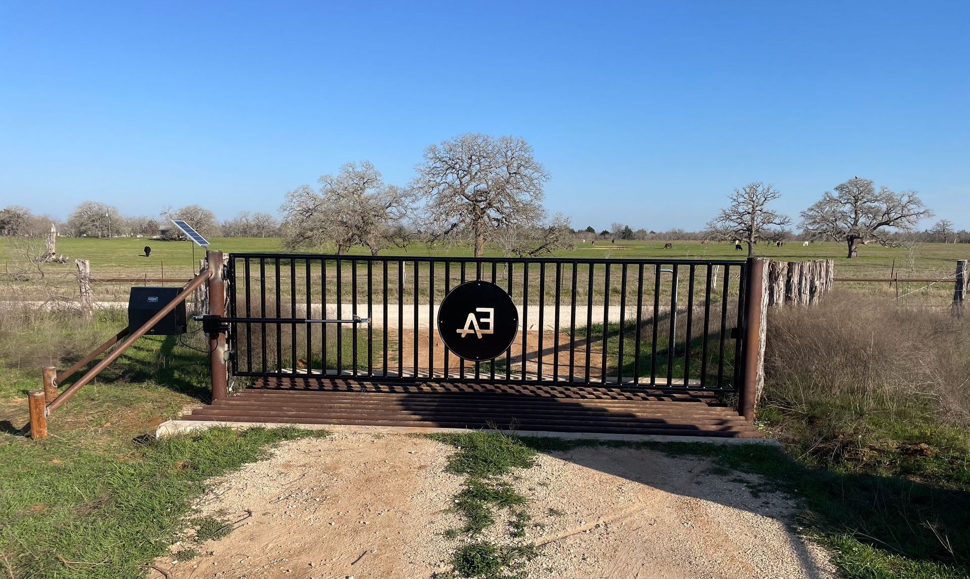 A metal gate with the letter e on it