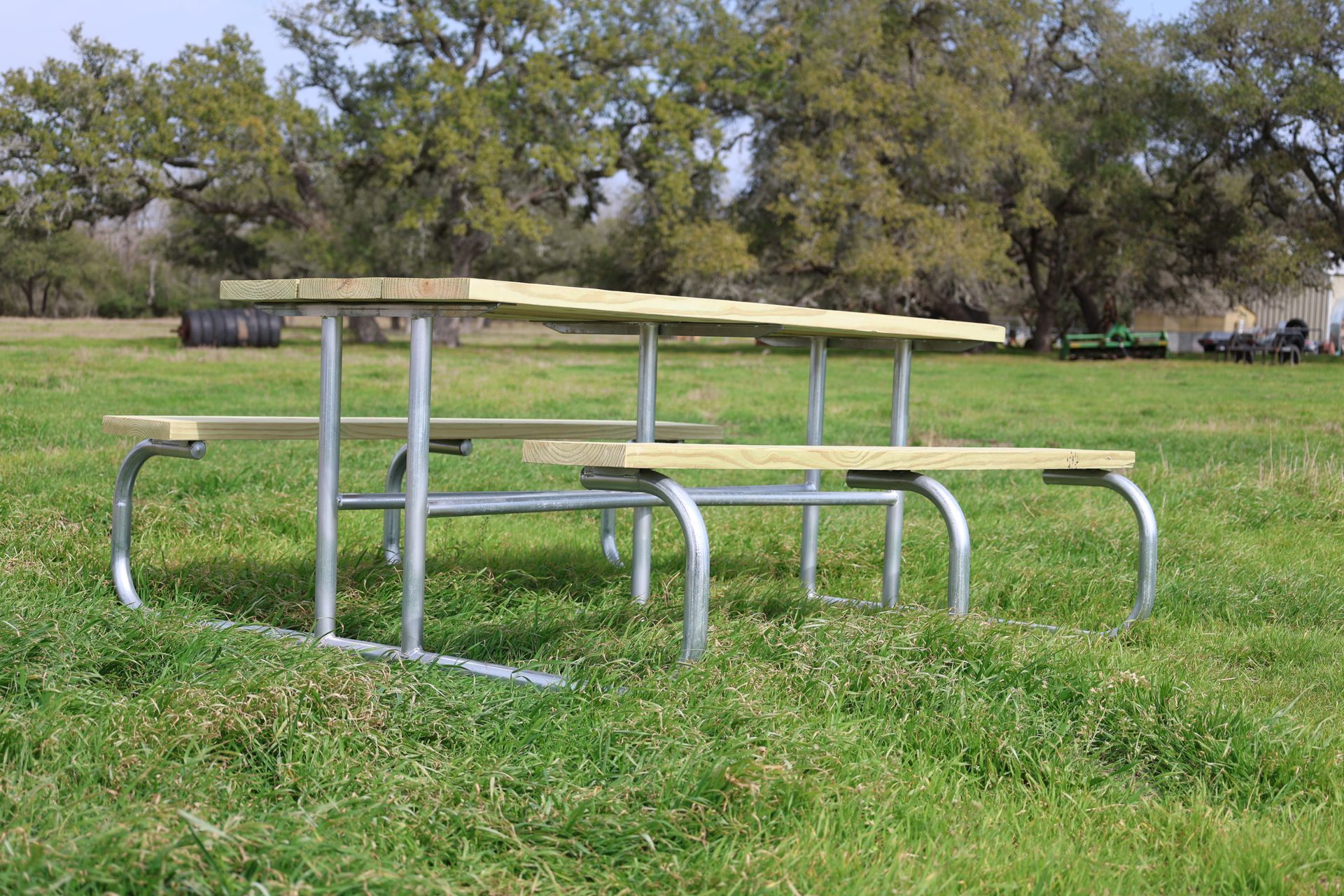 A wooden picnic table on a wooden deck