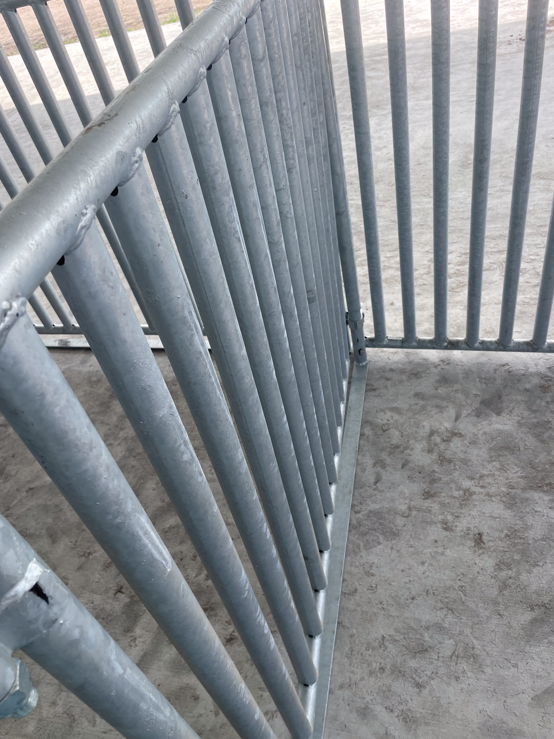 A close up of a metal railing on a staircase