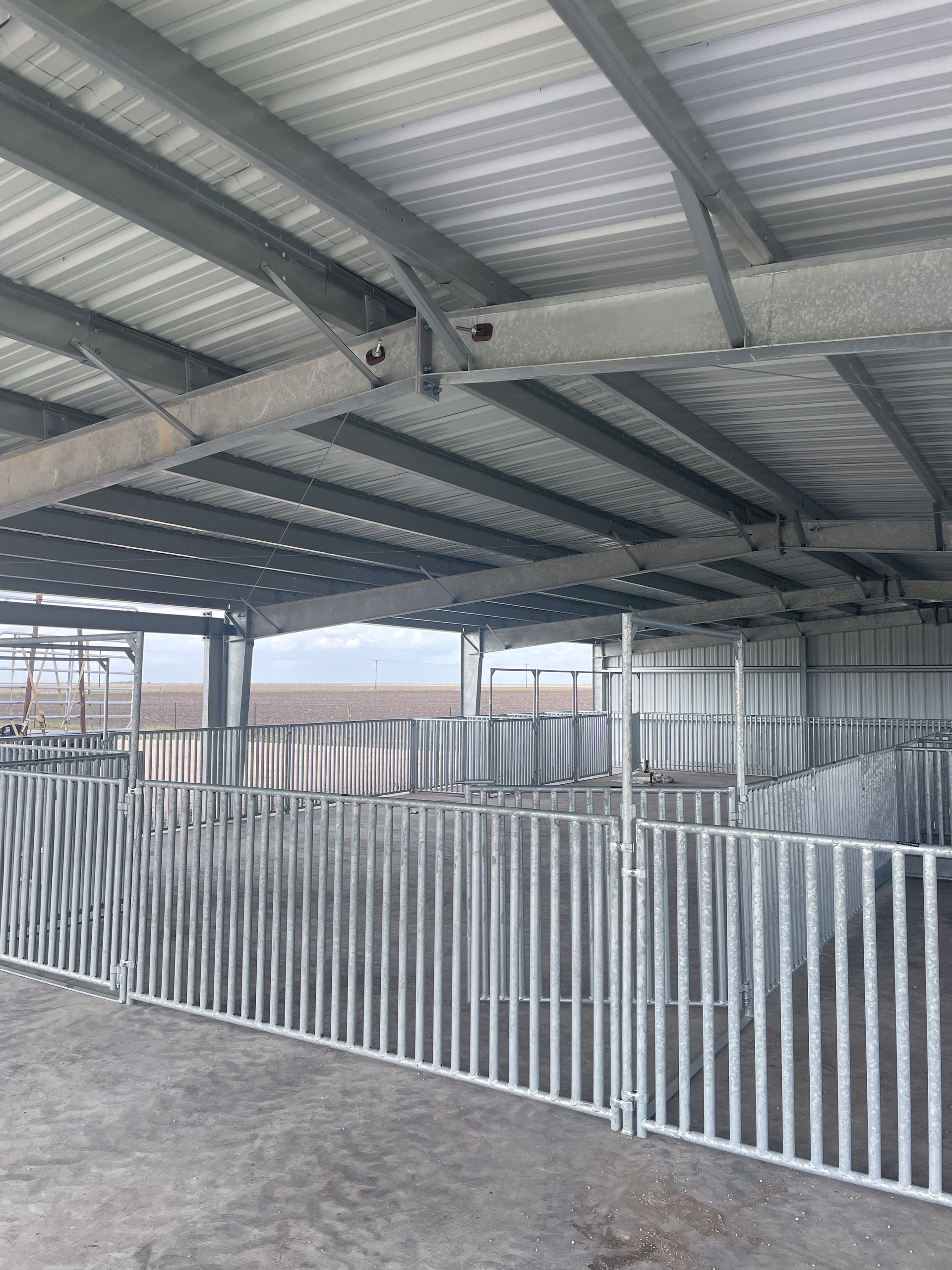 The inside of a building with a metal fence around it