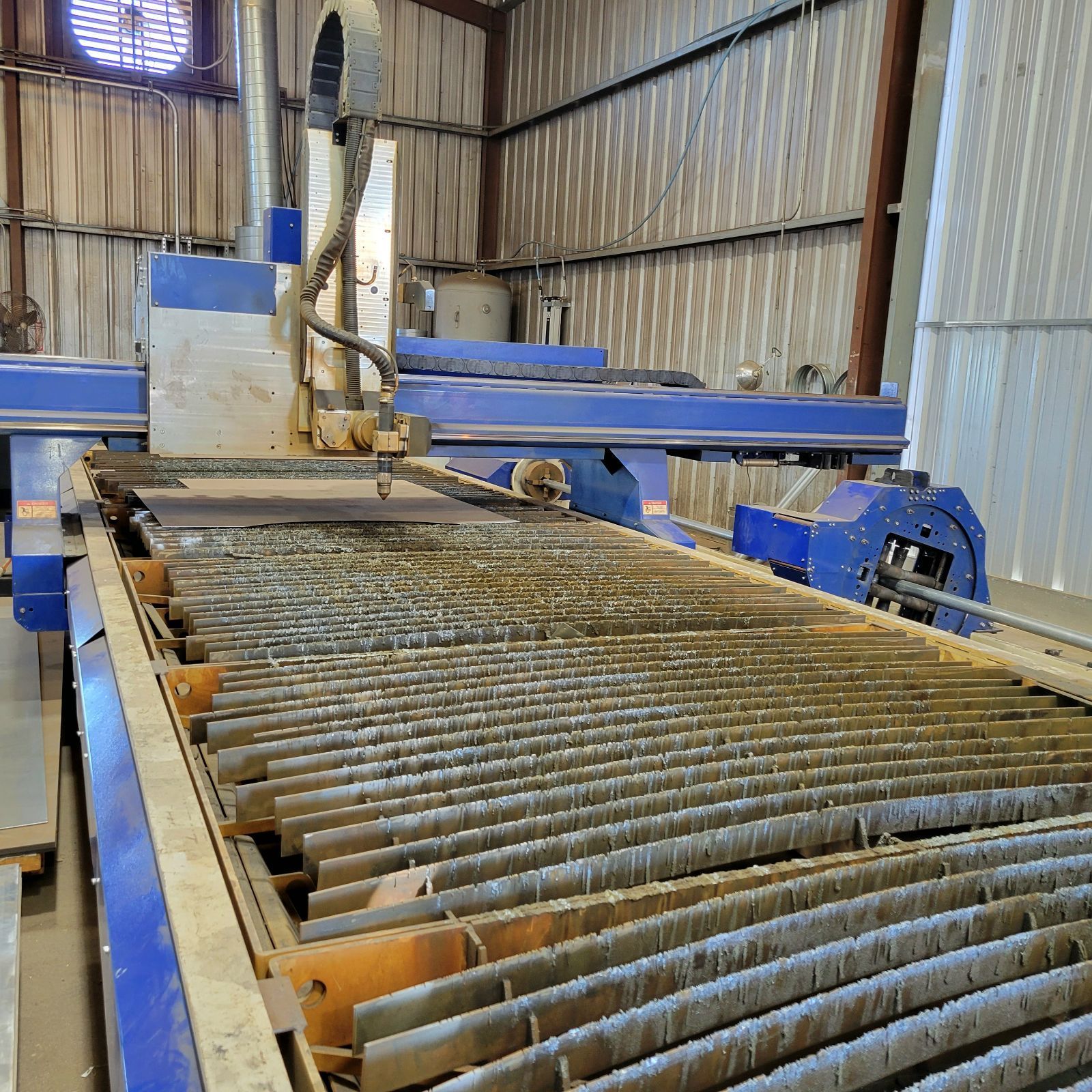 A plasma cutter at Ranger Gate's production shop
