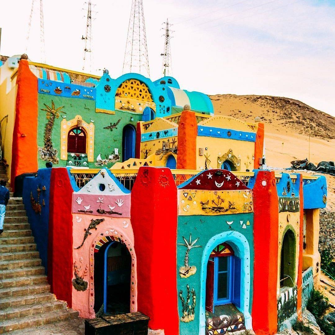 A colorful building with stairs leading up to it