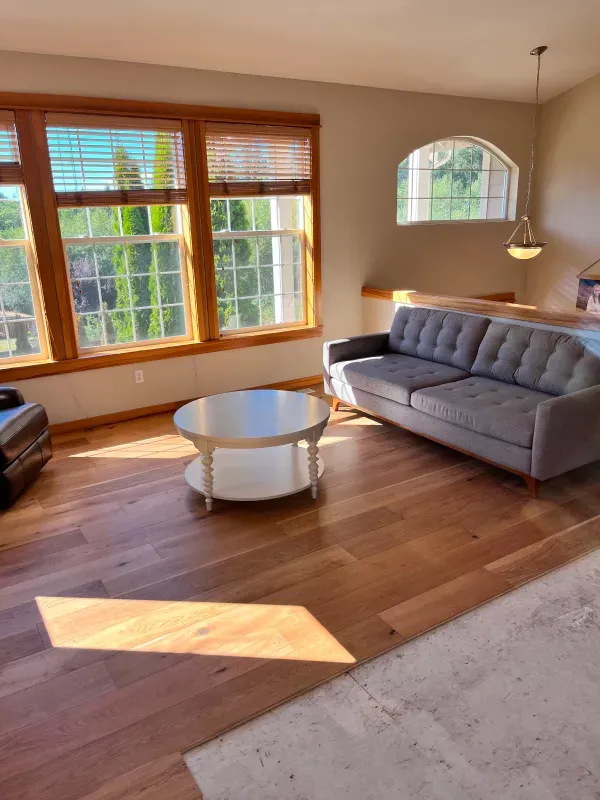 A living room with a couch and a coffee table