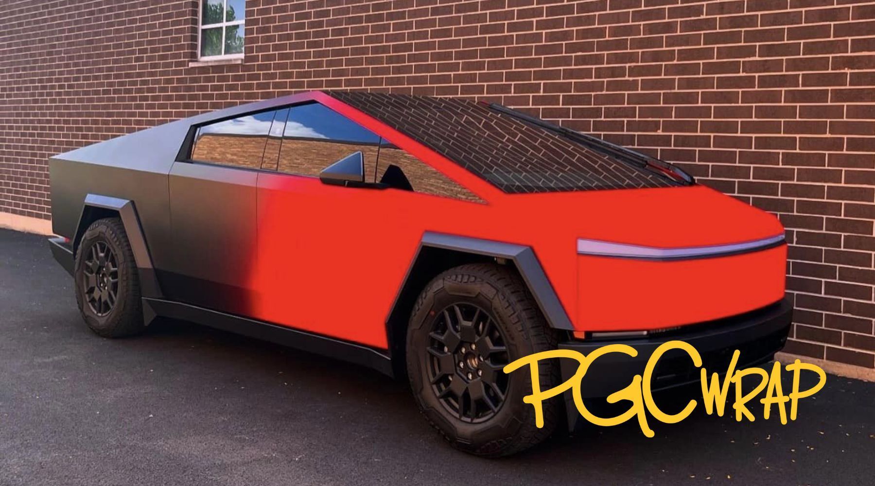 A Tesla Cybertruck wrapped in a striking gradient vinyl design that transitions from black to vibran