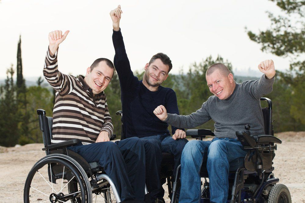 Three Disabled Happy Friends With Thumbs Up — iCan Support Services Kawana QLD