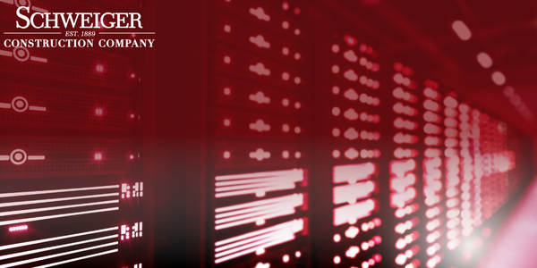 A red background with a schwanger construction company logo