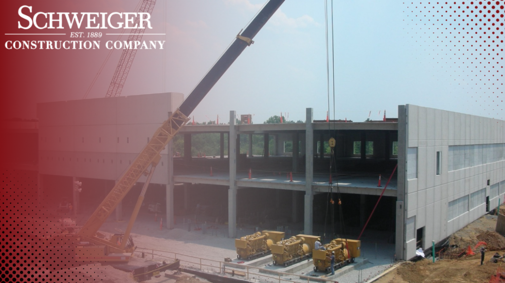 A large building is being built by the schweizer construction company
