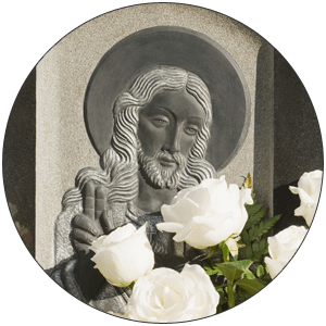 Headstone  with flowers—memorials in Bronx, NY
