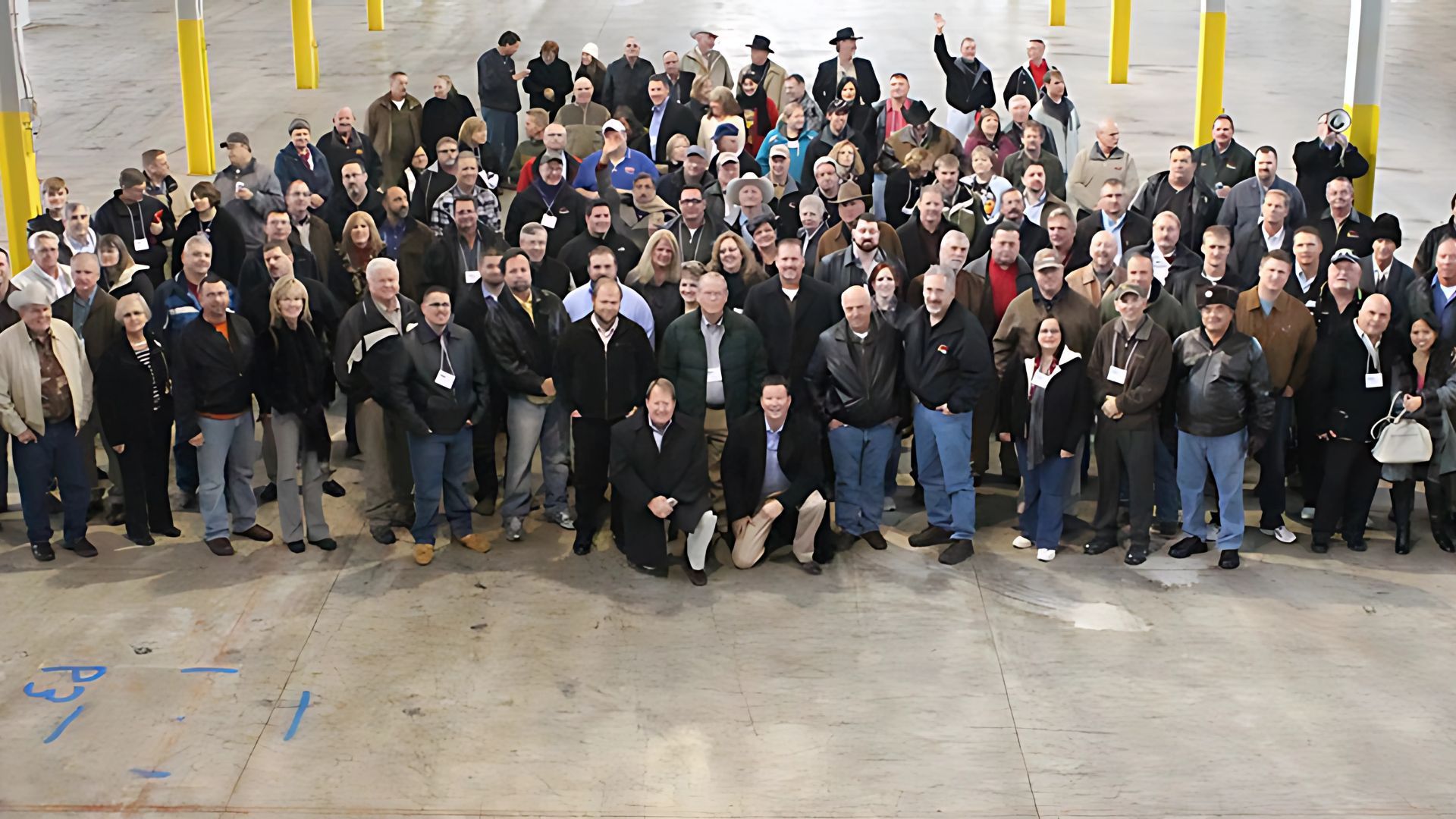 A large group of people are posing for a picture