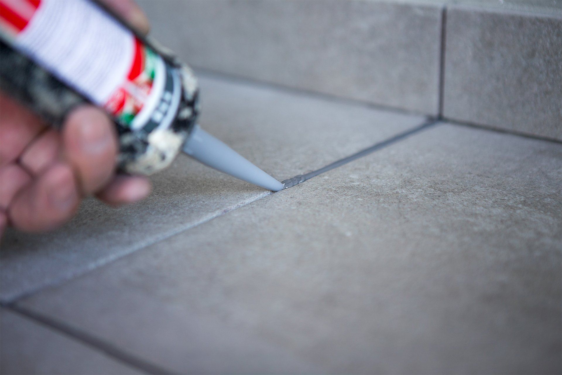 Applying Sealant on Concrete Tiles