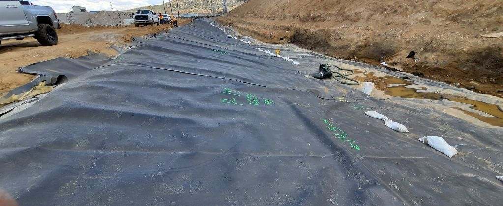 worker installing a liner