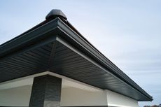 A roof with a chimney on top of it