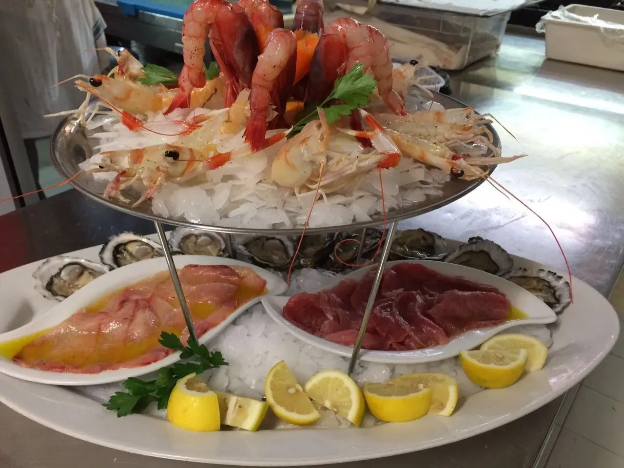 A plate of seafood is sitting on a table.