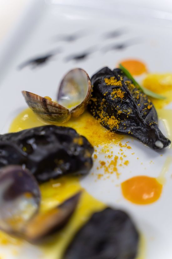 A plate of seafood is sitting on a table.