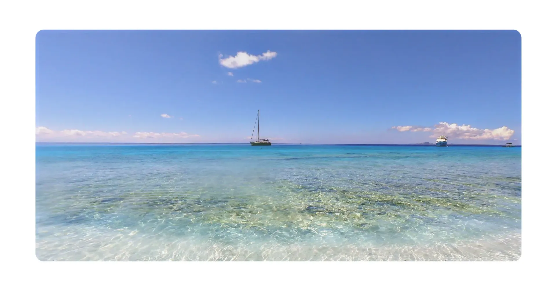 Sailing yacht Galaxie moored at beach on Klein Curacao Trips