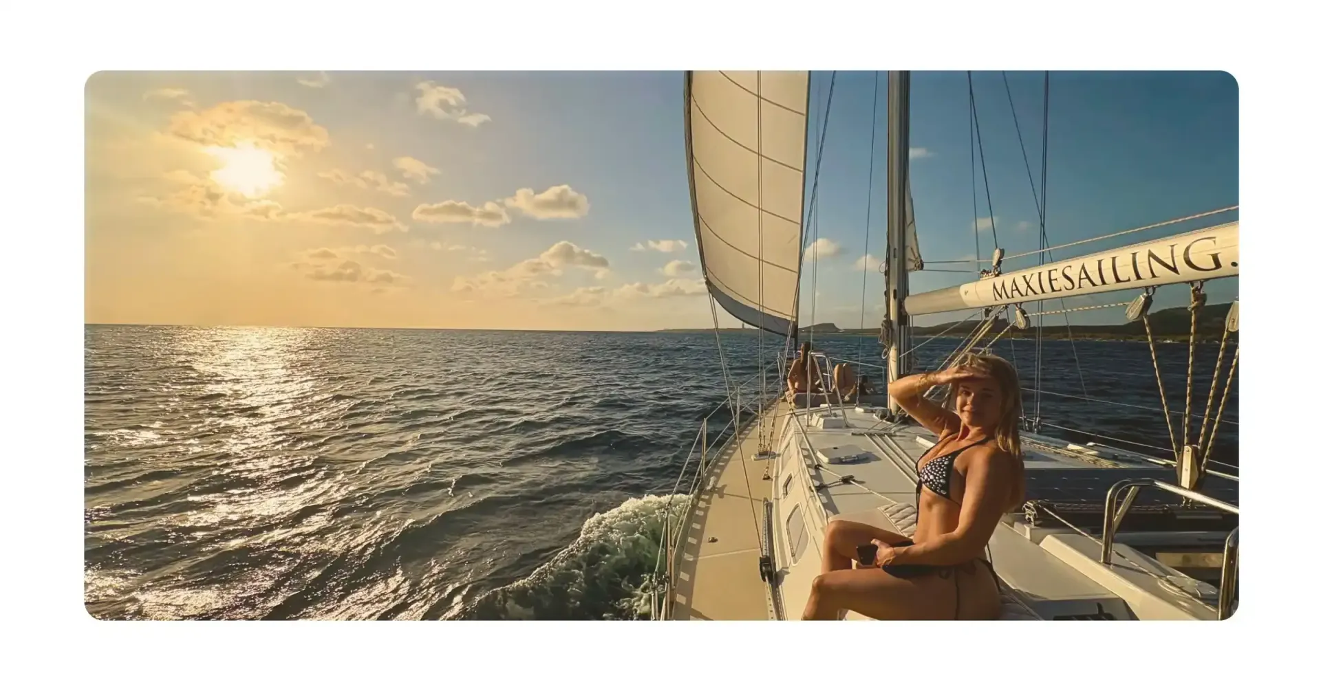 family enjoying a laid-back sunset tour with Maxie Sailing Curacao excursions