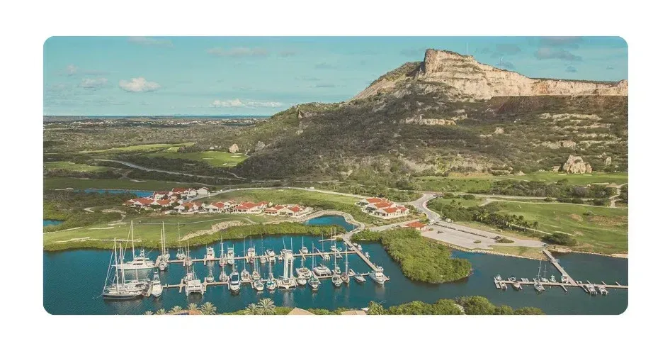 Sailboat Galaxie docked at the private Seru Boca Marina