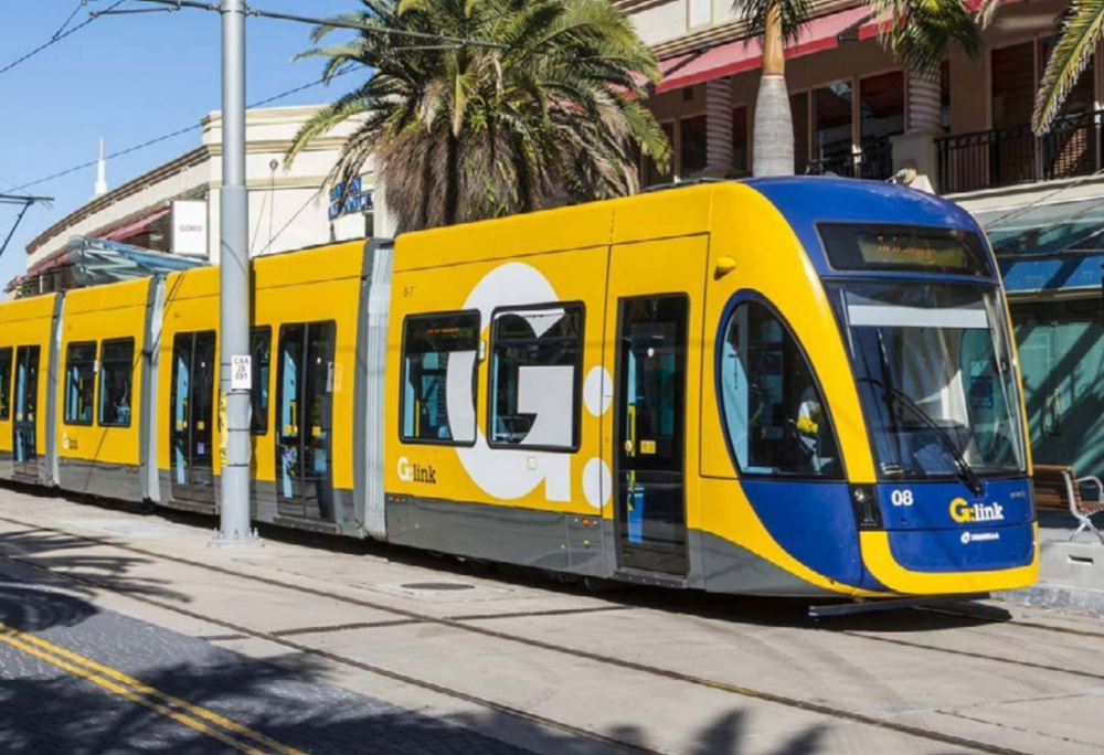 Illuminated Tall Building in the City Night Skyline — Construction Services in Southport, QLD