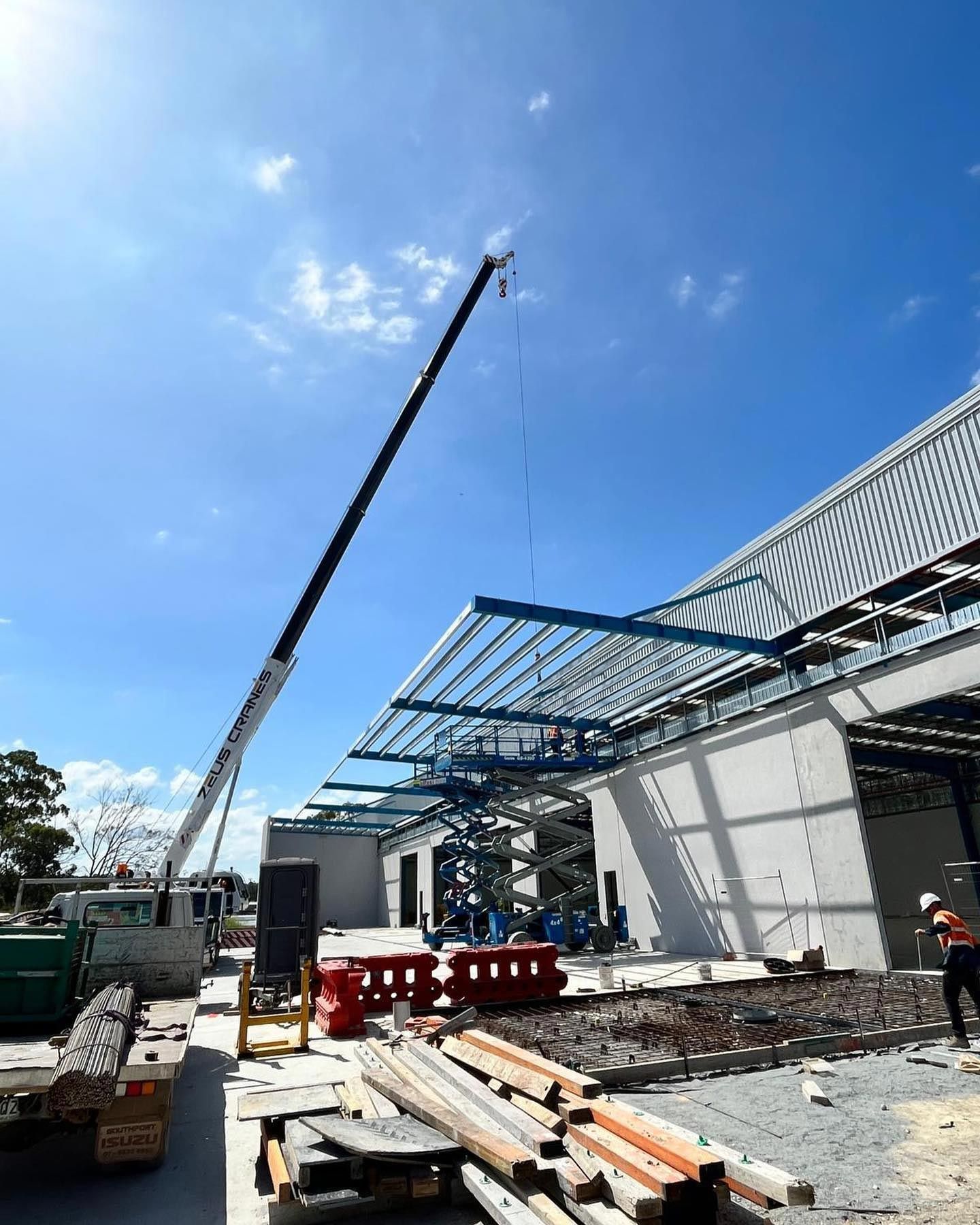 Ongoing Construction With A Crane On The Site