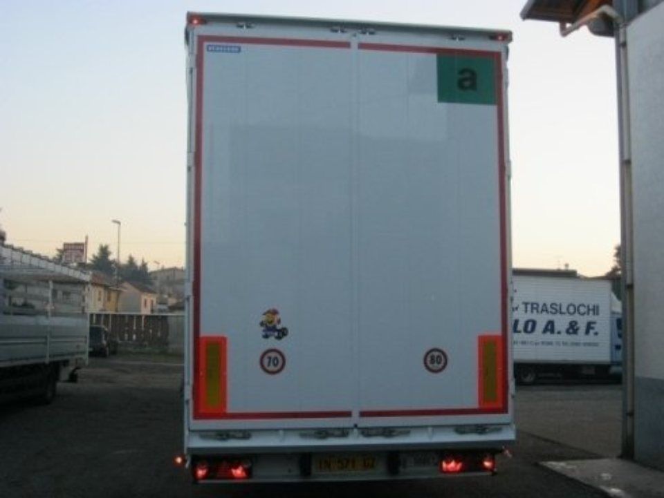 riparazione coperture posteriori camion