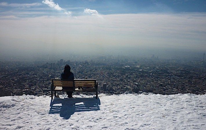 Watch city of Tehran while skiing 