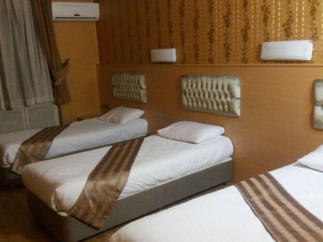 Three Beds Room,Tehran Omid Hotel,Tehran hotels, iran hotels ,2 star hotel in tehran
