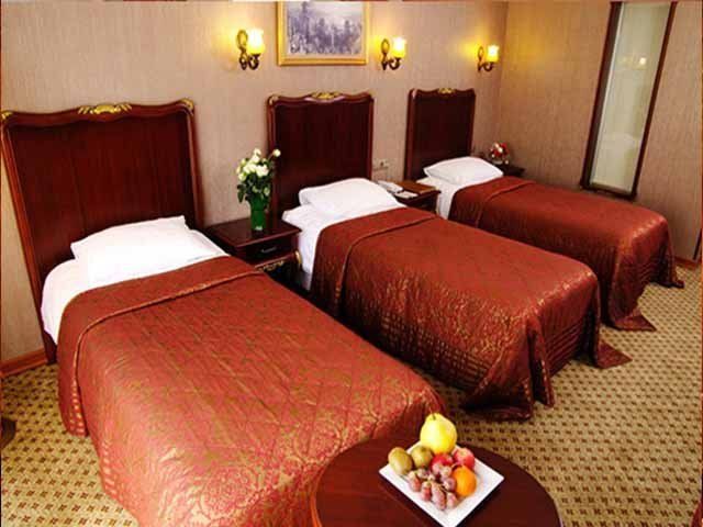 Three Beds Room,Tehran Parsian Kowsar Hotel ,Tehran hotels, iran hotels  ,4 star hotel in tehran