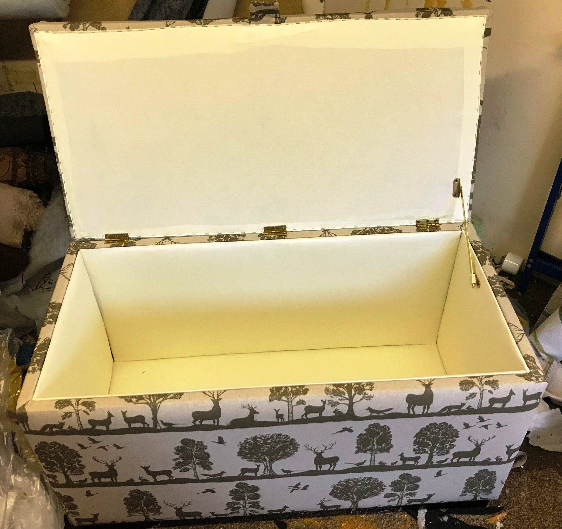 An open storage box that's empty inside