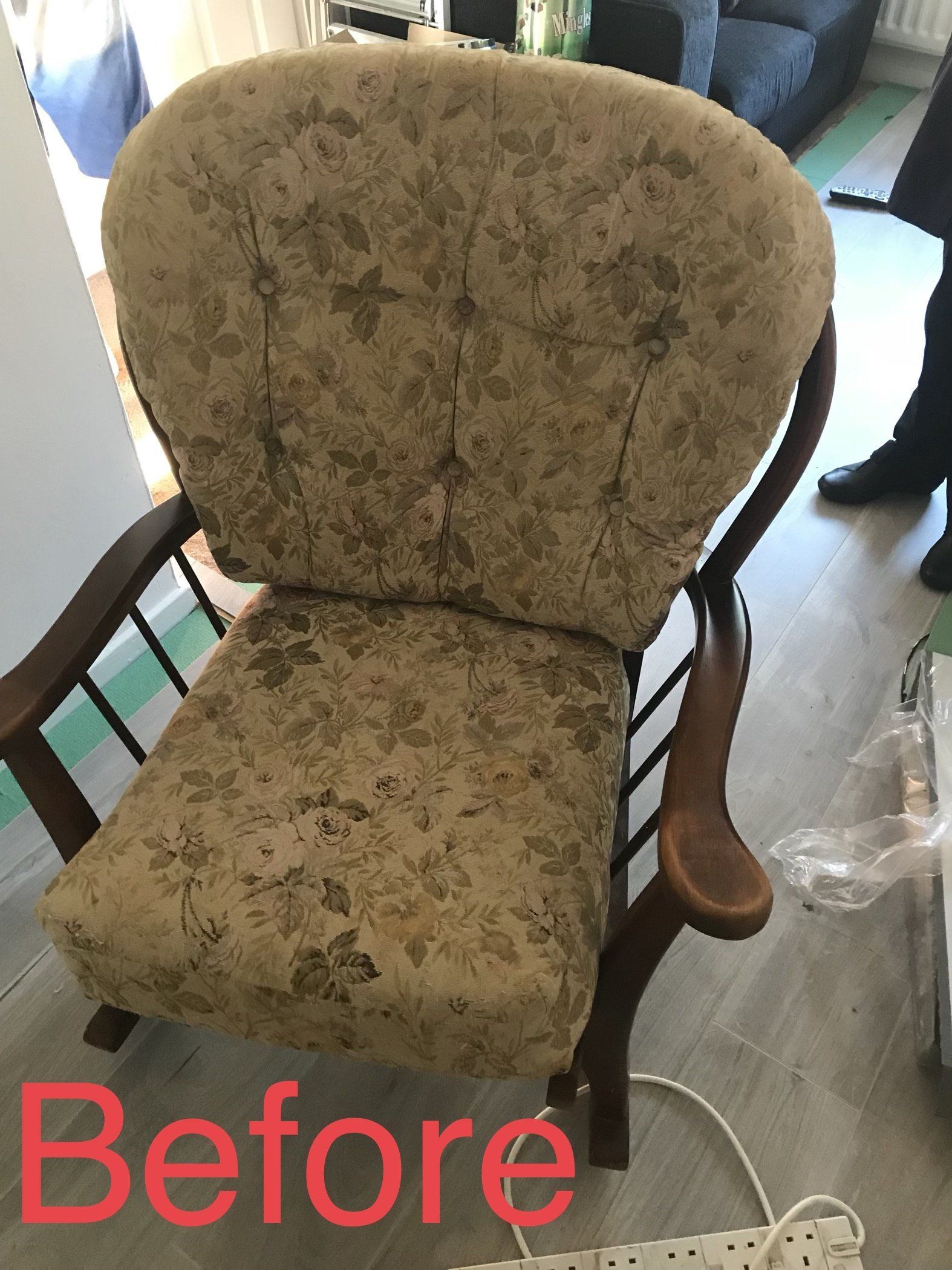 Wooden chair with discoloured upholstery