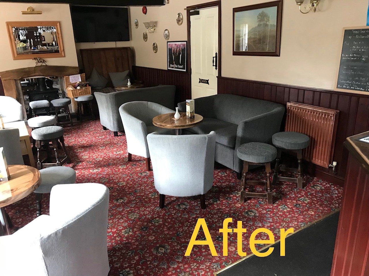 Seating in a pub with red carpet