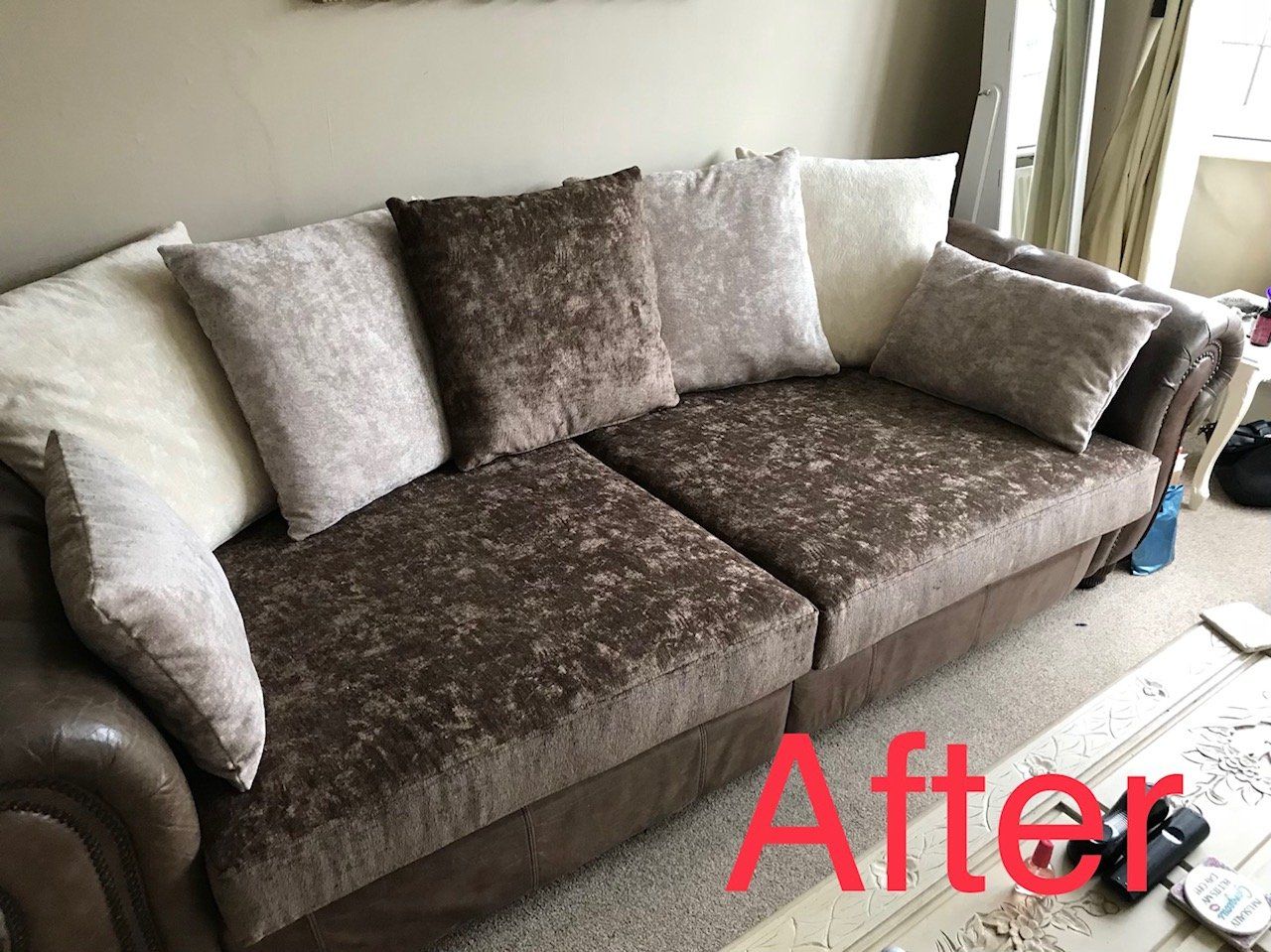 Large brown sofa with cushions