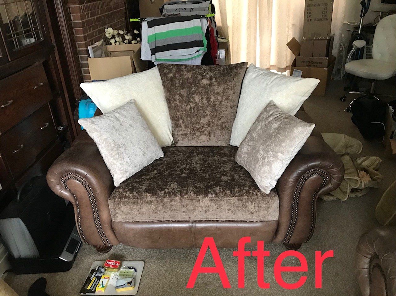 Small brown sofa with cushions