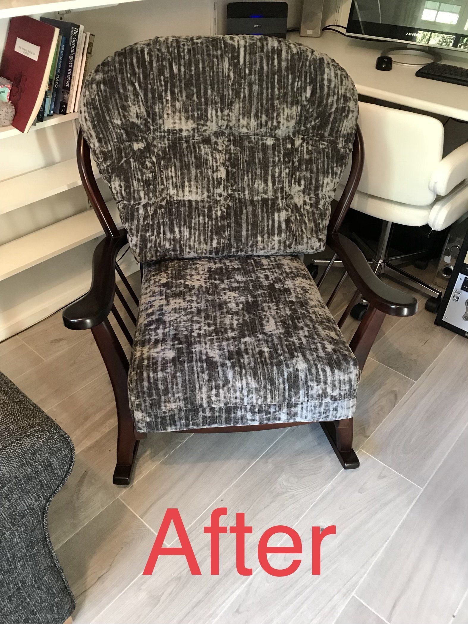 Newly upholstered dark grey chair
