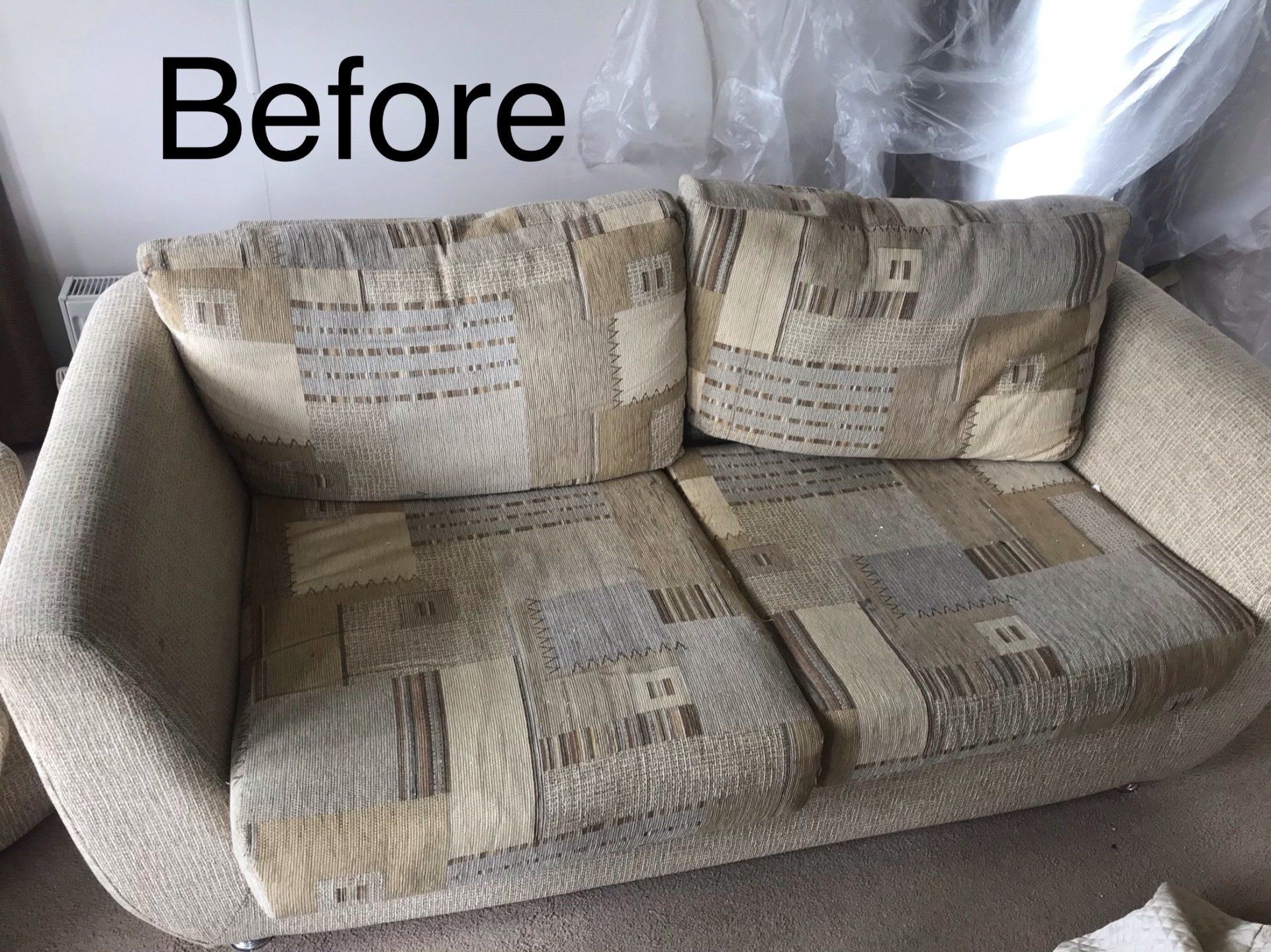 Neutral coloured patchwork patterned sofa