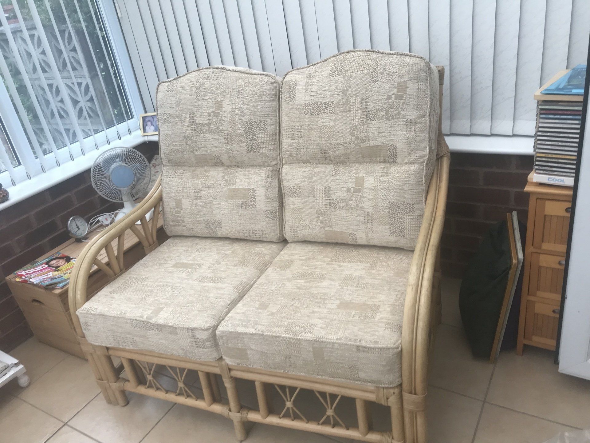 Grey wicker loveseat
