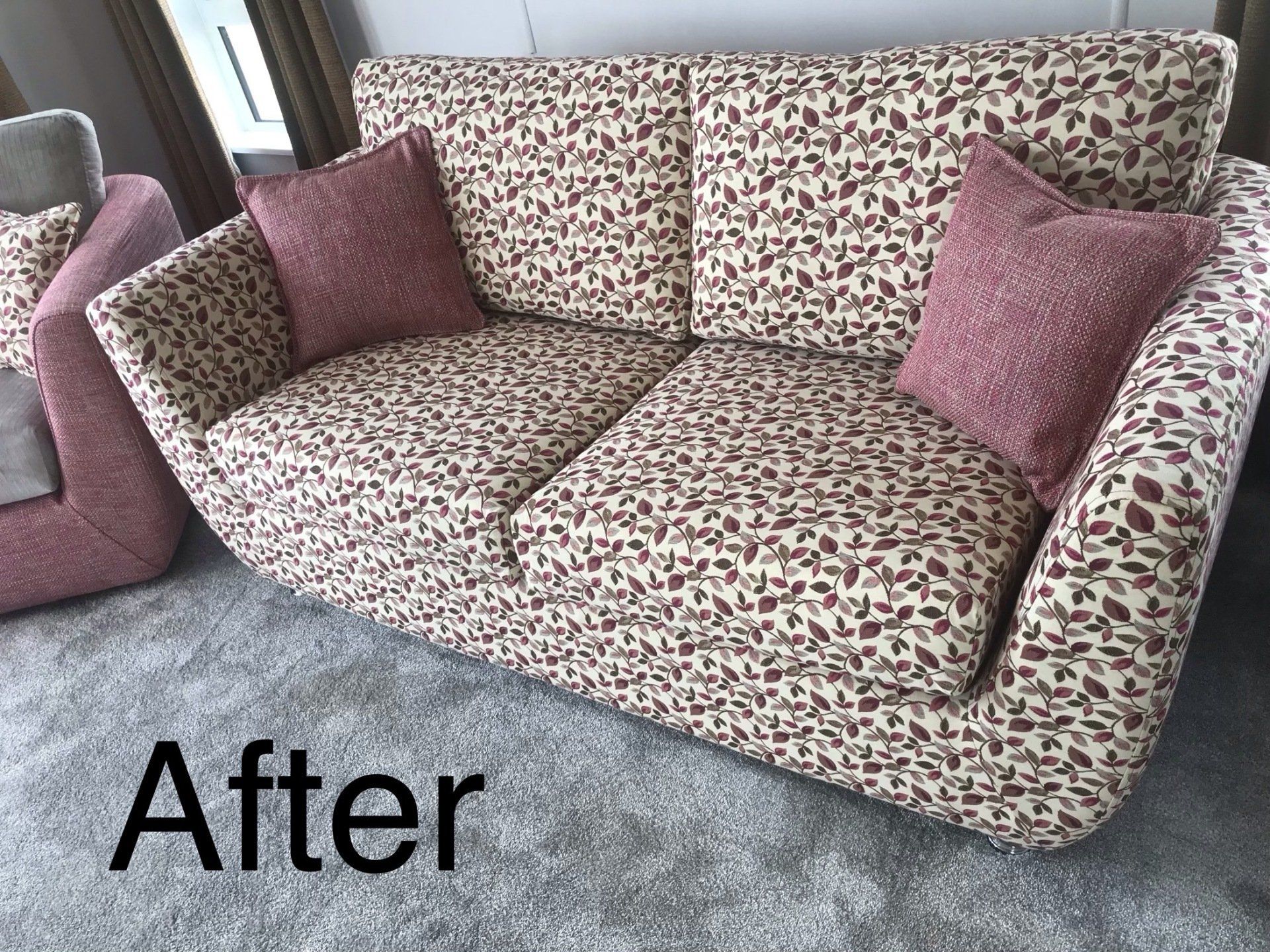 Patterned sofa with purple cushions