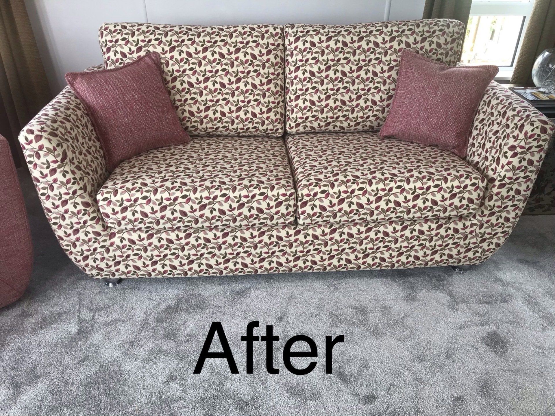 Patterned sofa with purple cushions