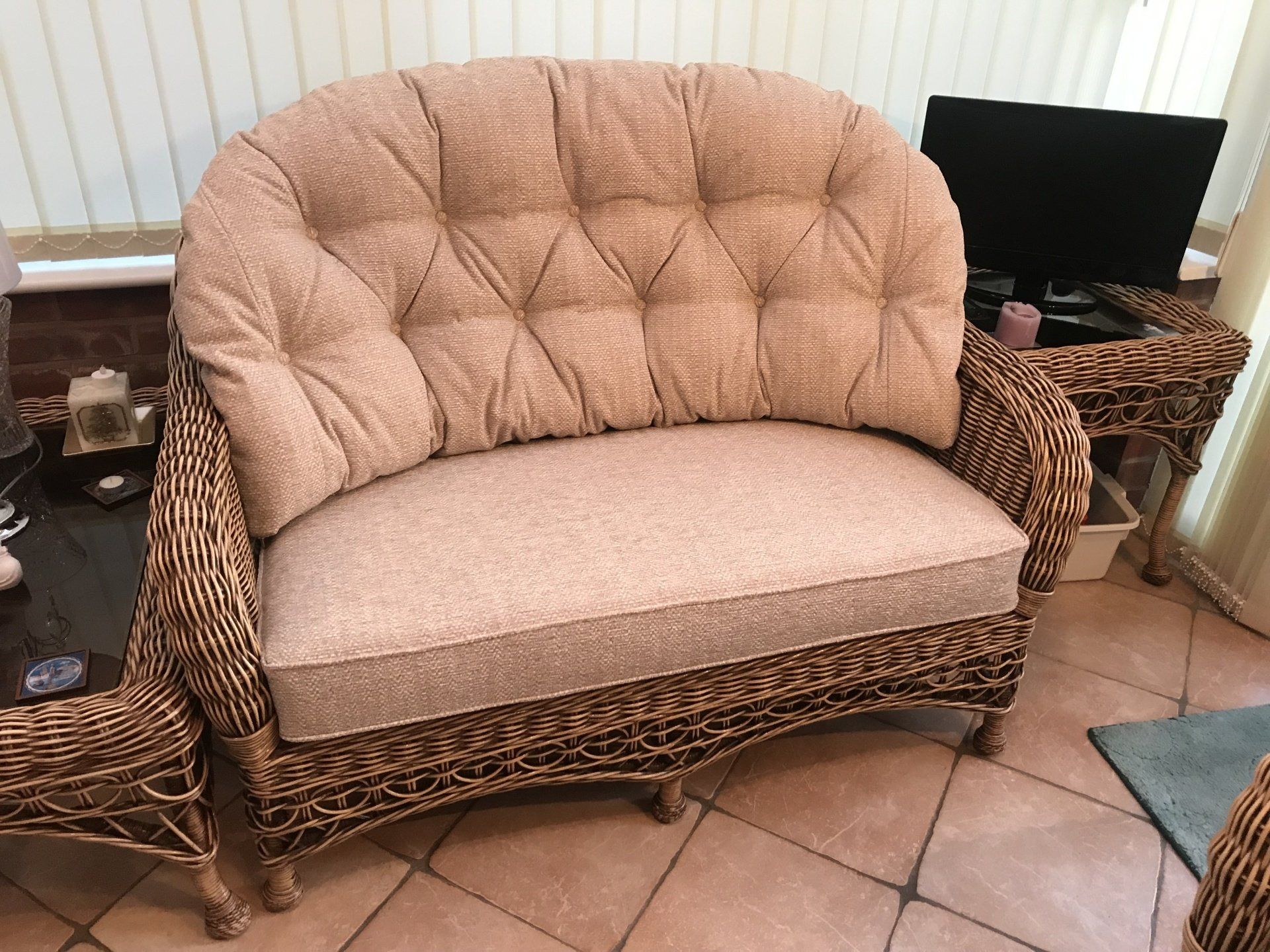 Pink wicker sofa