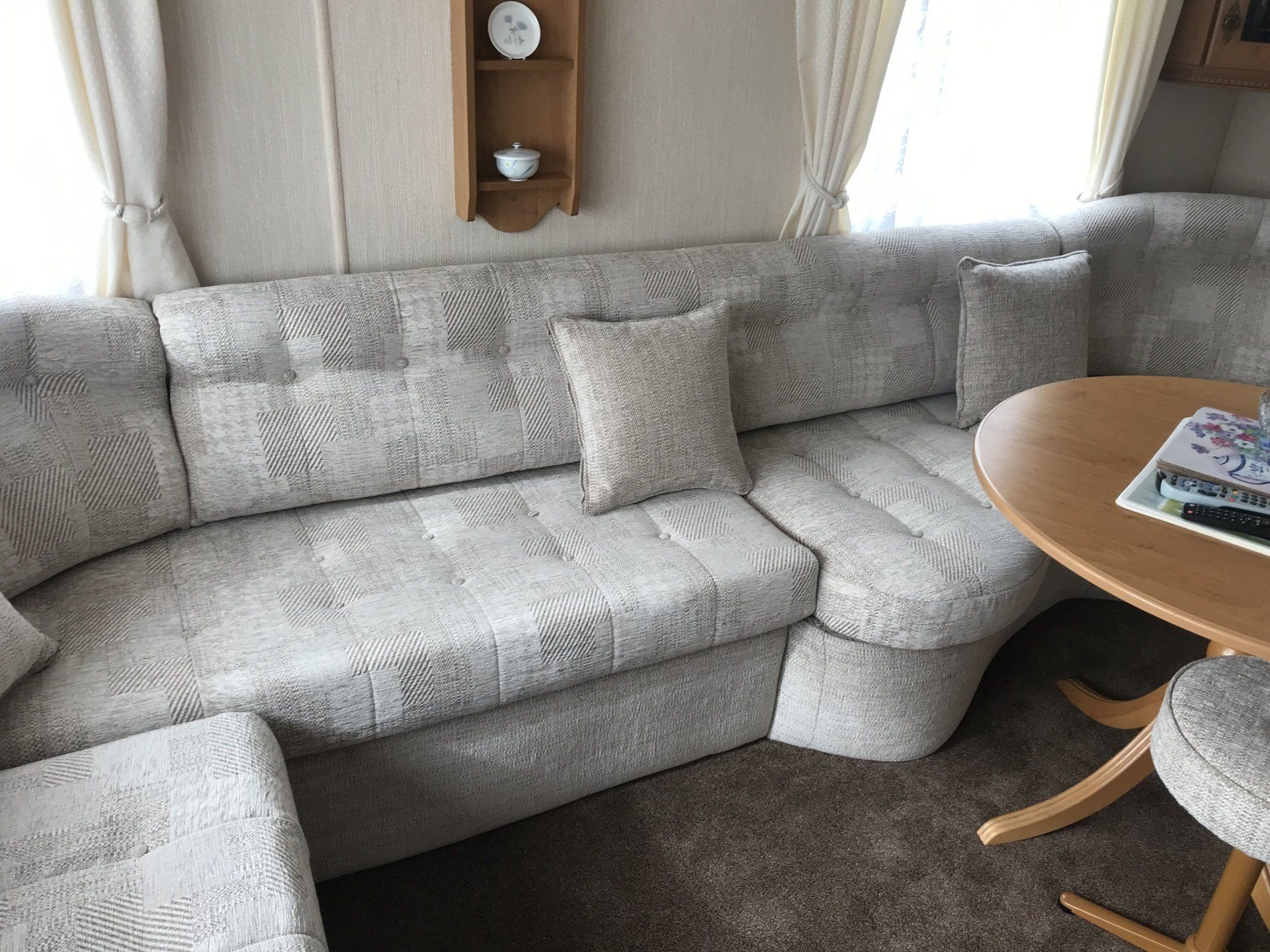 Large grey sofa and matching cushions