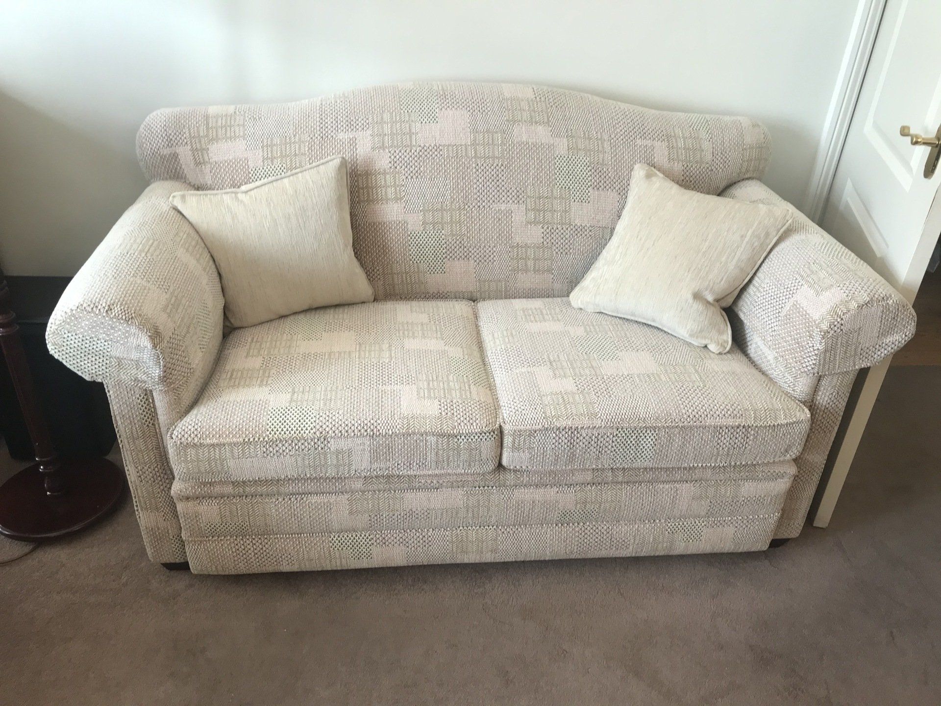 Grey sofa with two cushions