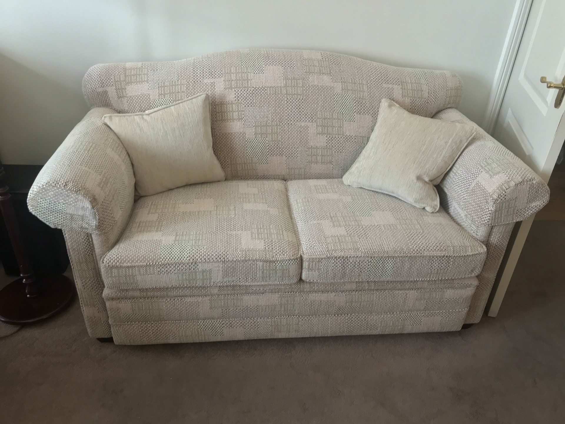 Soft grey sofa with matching cushions