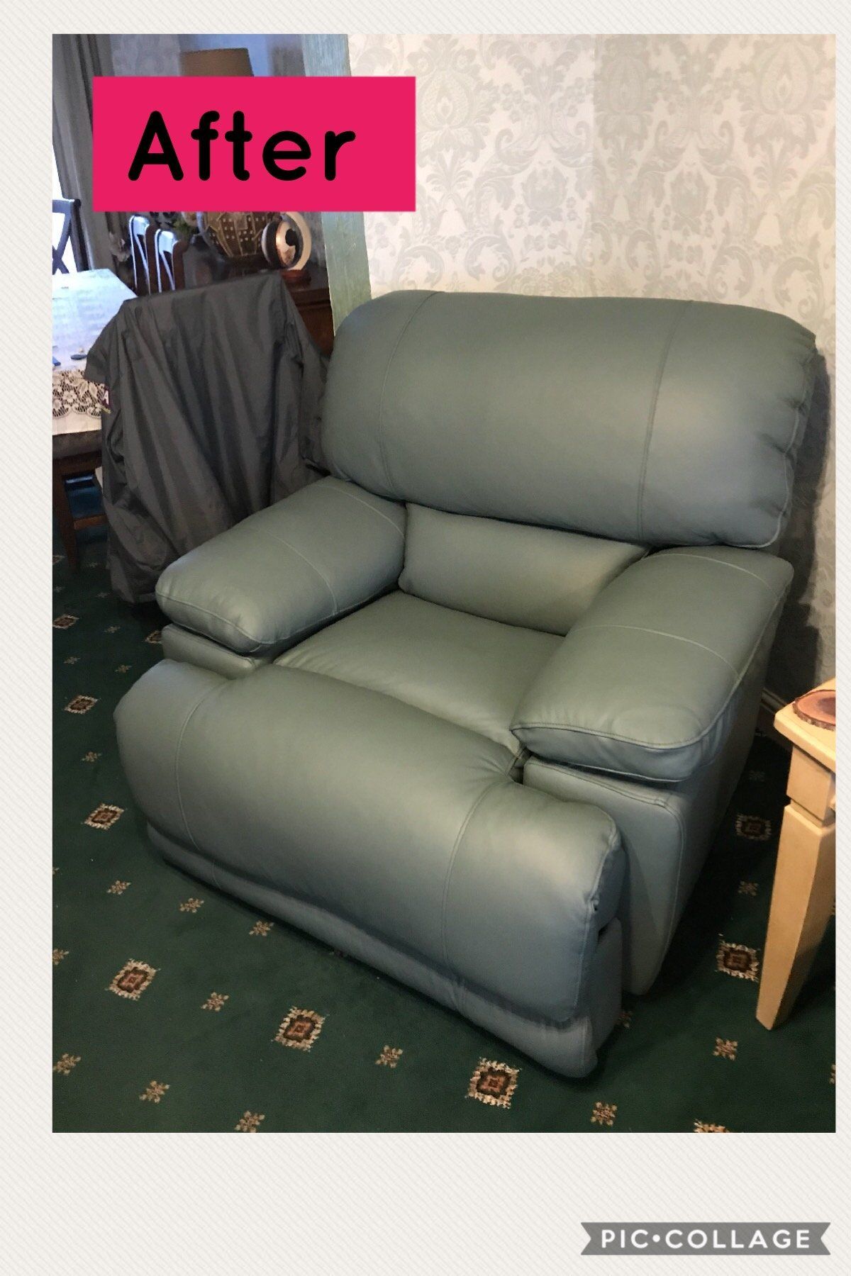 Grey armchair on a green carpet