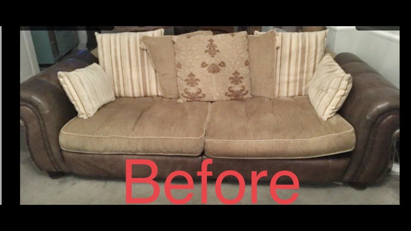 A light brown sofa with cushions