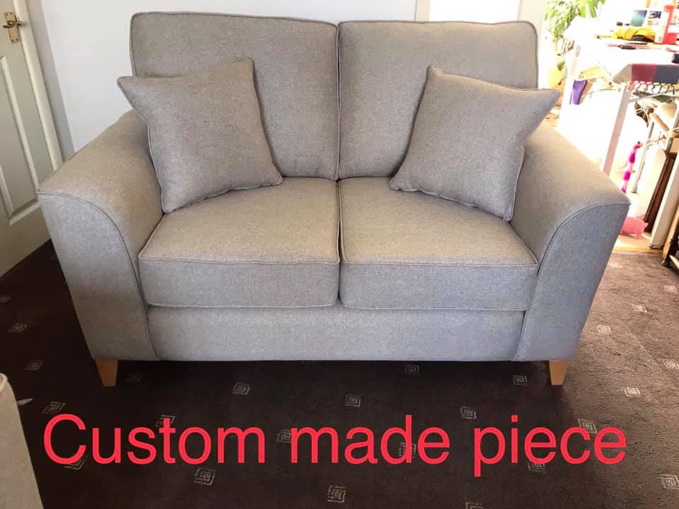 Grey sofa with matching cushions