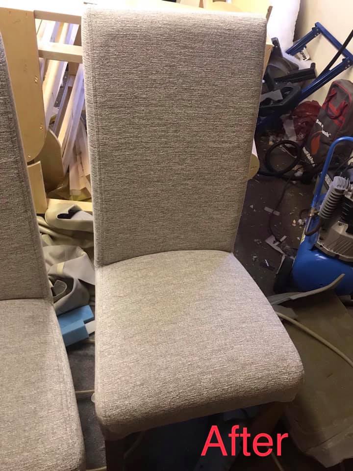 A newly upholstered grey chair